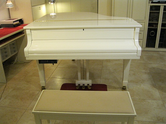 1983 Yamaha G2 Grand 5-ft-7" with a custom "Wapin Bridge System"