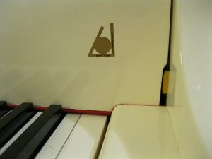 1983 Yamaha G2 Grand 5-ft-7" with a custom "Wapin Bridge System"